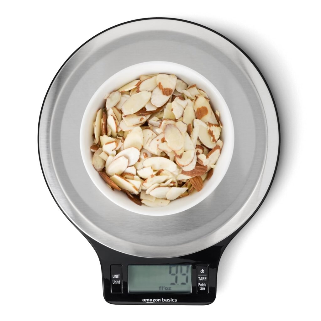 Amazon Basics Digital Kitchen Scale with LCD display on a wooden kitchen counter