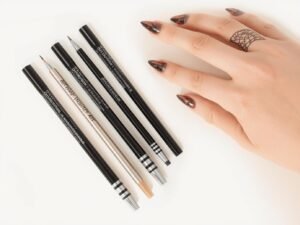 Artdone Metallic Nail Art Pens and Liner Brushes Set, a best nail art kit for beginners in 2025, shown with a beautiful nail design example