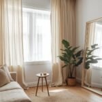 Small living room makeover with NICETOWN linen curtains, a mirror, and cozy decor on a budget
